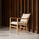 Carl Hansen CH44 Lounge Chair in Oak Oil — lifestyle, with cushions