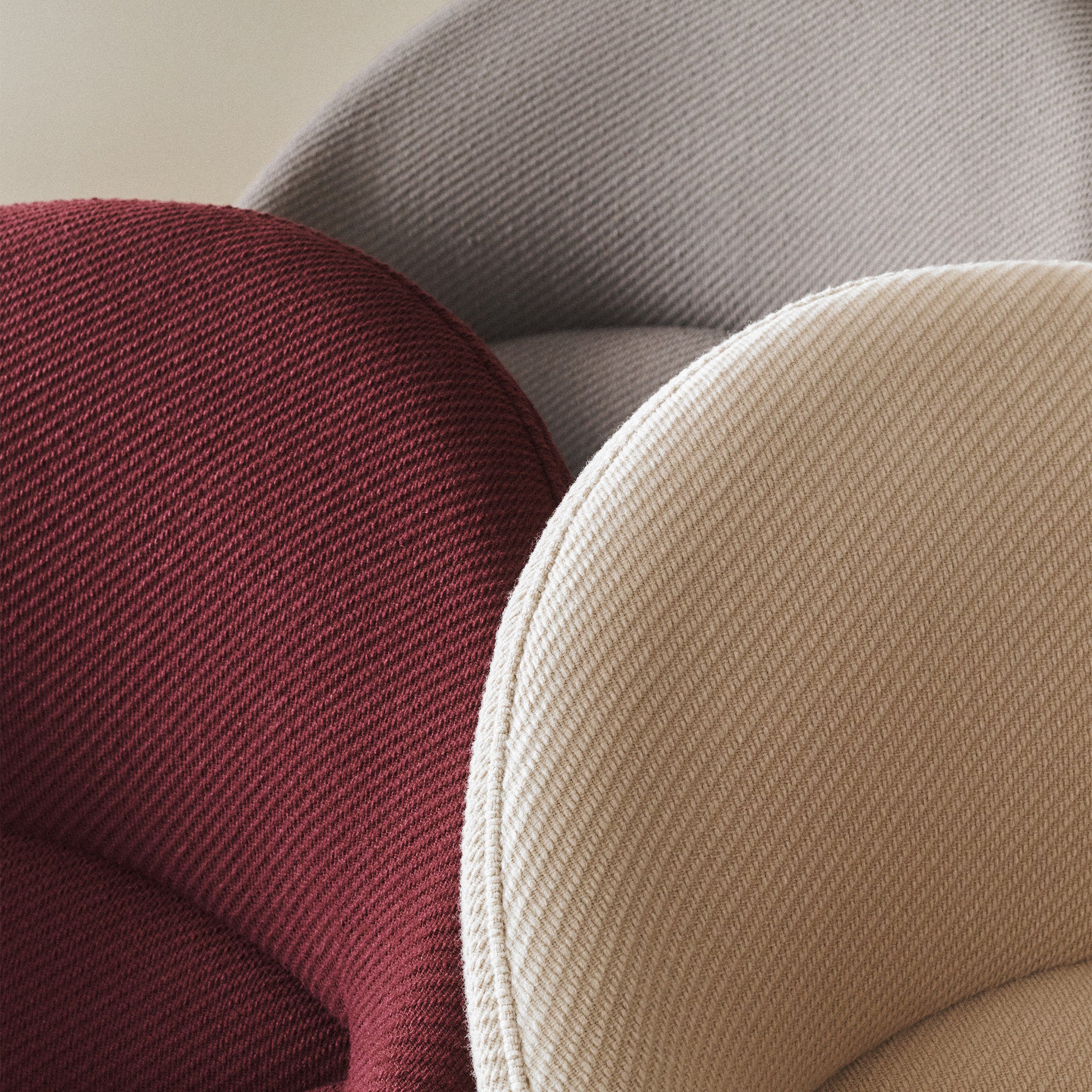 Carl Hansen CH468 Oculus Chair Special Edition in Deep Burgundy, Clay White and Pebble Brown — studio, upholstery detail