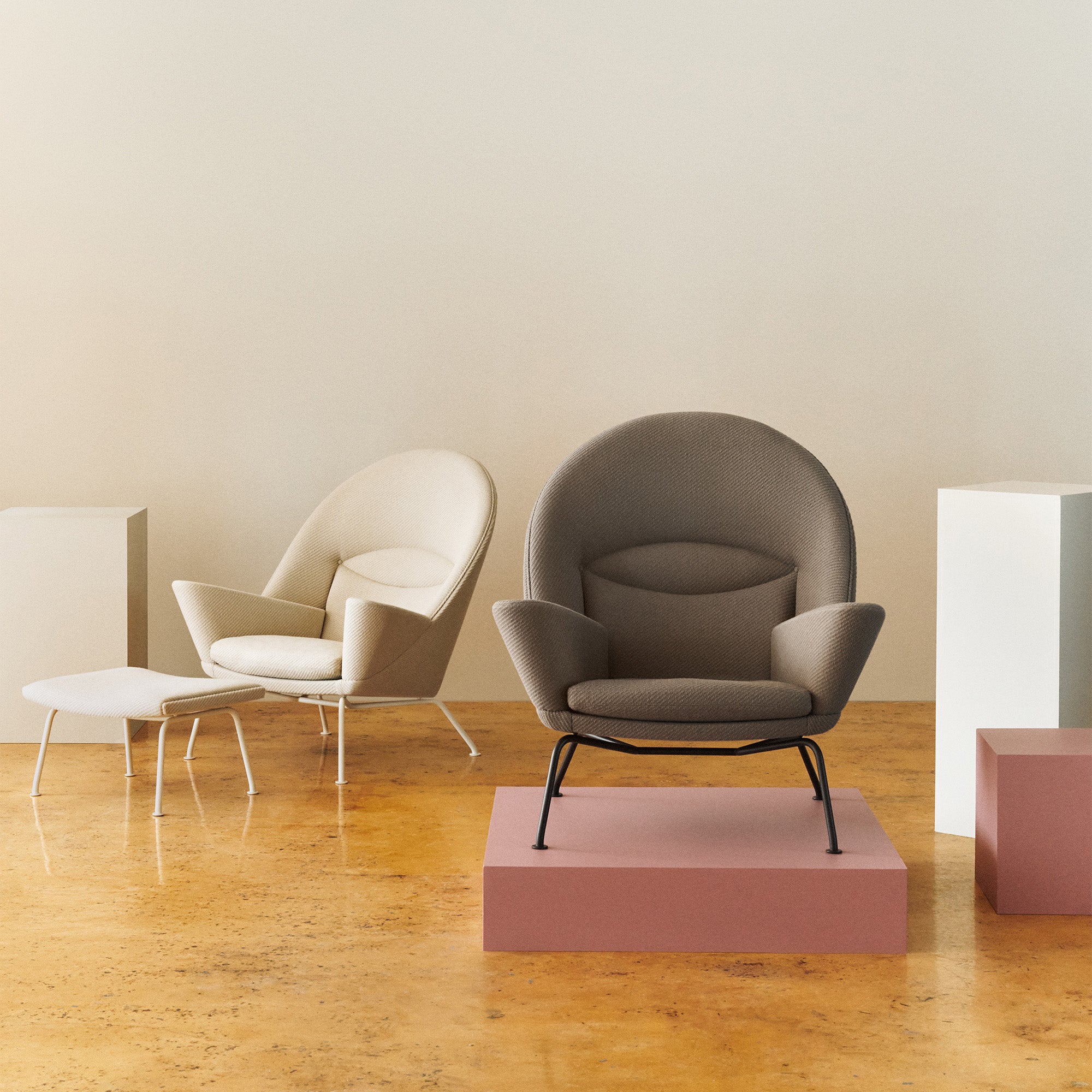 Carl Hansen CH468 Oculus Chair Special Edition in Pebble Brown and Clay White — studio, with CH446 Footrest