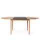 Carl Hansen BM0121 Extendable Round Dining Table in Oak Oil with MDF Black extension leaf