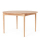 Carl Hansen BM0121 Extendable Round Dining Table in Oak Soap — three-quarter view