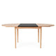 Carl Hansen BM0121 Extendable Round Dining Table in Oak Soap with MDF Black extension leaf
