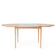 Carl Hansen BM0121 Extendable Round Dining Table in Oak Soap with MDF Grey extension leaf — extended view