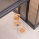 Skagerak Pelagus Outdoor Café Table in Light Ivory — lifestyle
