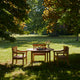 Skagerak Drachmann Outdoor Dining Chair and Round Dining Table — lifestyle