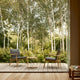 Carl Hansen E018 Embrace Outdoor Lounge Chair in Untreated Teak with Panama Hollin 1779 Cushion — lifestyle