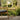 Carl Hansen E023 Embrace Outdoor Lounge Table in Teak — lifestyle, with E018 Outdoor Lounge Chair