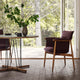 Carl Hansen E020 Embrace Dining Table — lifestyle, detail, with E005 Embrace Dining Armchair