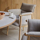 Carl Hansen E020 Embrace Dining Table — lifestyle, detail, with E005 Embrace Dining Armchair