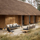 Carl Hansen Embrace Outdoor Sofa Modules in Teak — lifestyle, with E500, E510, E520 and E023 Lounge Table