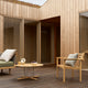 Carl Hansen Embrace Outdoor Sofa Modules in Teak — lifestyle, with E511, AH601 and E023 Lounge Table
