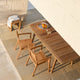 Skagerak Ballare Armchair and Dining Table 196cm with Cutter Stool in Teak — lifestyle 2