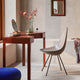 Fritz Hansen 3110 Drop Chair in Deep Clay — lifestyle, with Slide storage pouf