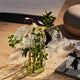 Fritz Hansen Ikeru Vase High — lifestyle, floral arrangement on marble coffee table