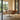 Fritz Hansen 3208 Lily Armchair in Walnut veneer — lifestyle, dining room with A825 table and Clam Portable lamp
