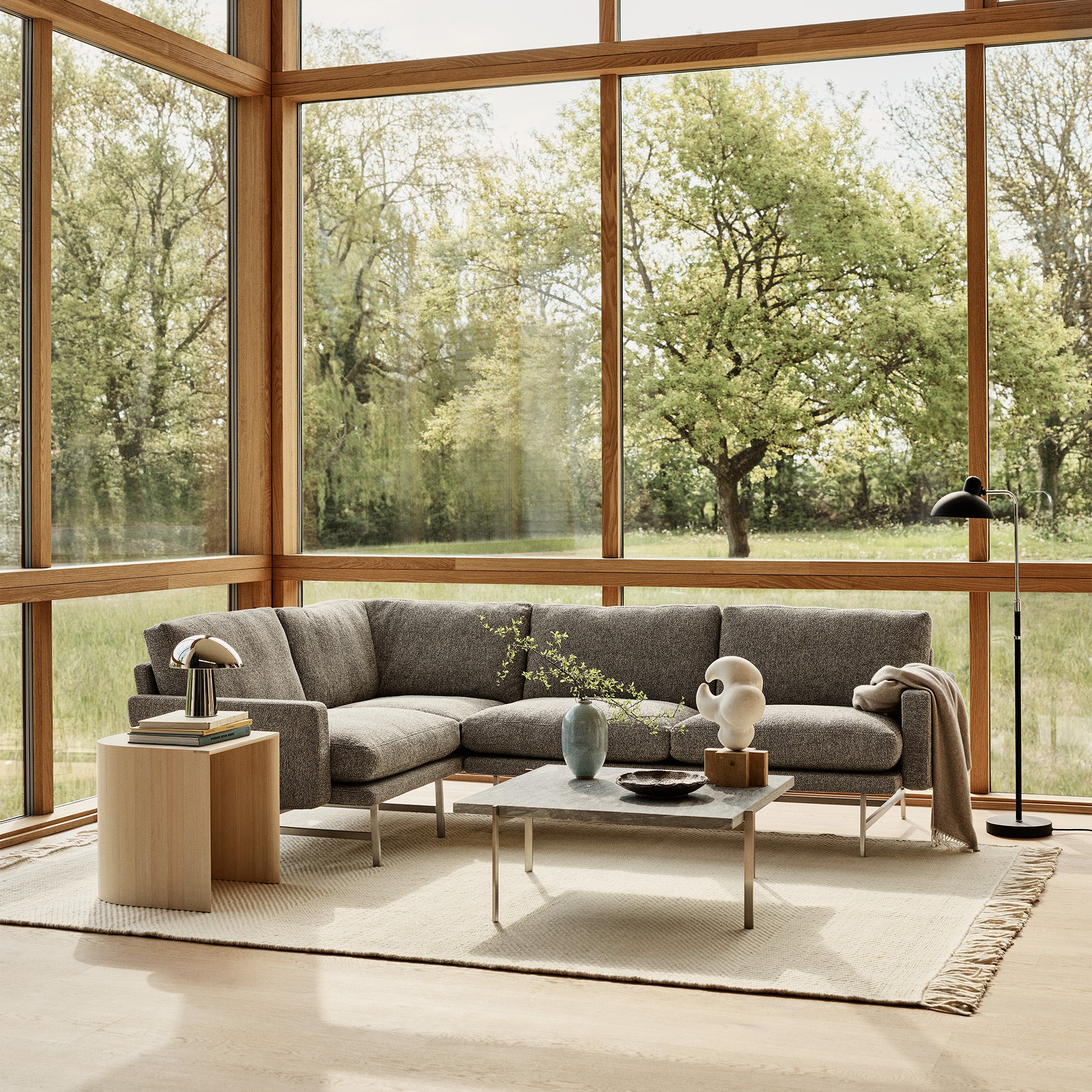 Fritz Hansen PL114 Lissoni 4 Seater Corner Sofa in Moss 015 — lifestyle, with PK61 and Night Owl