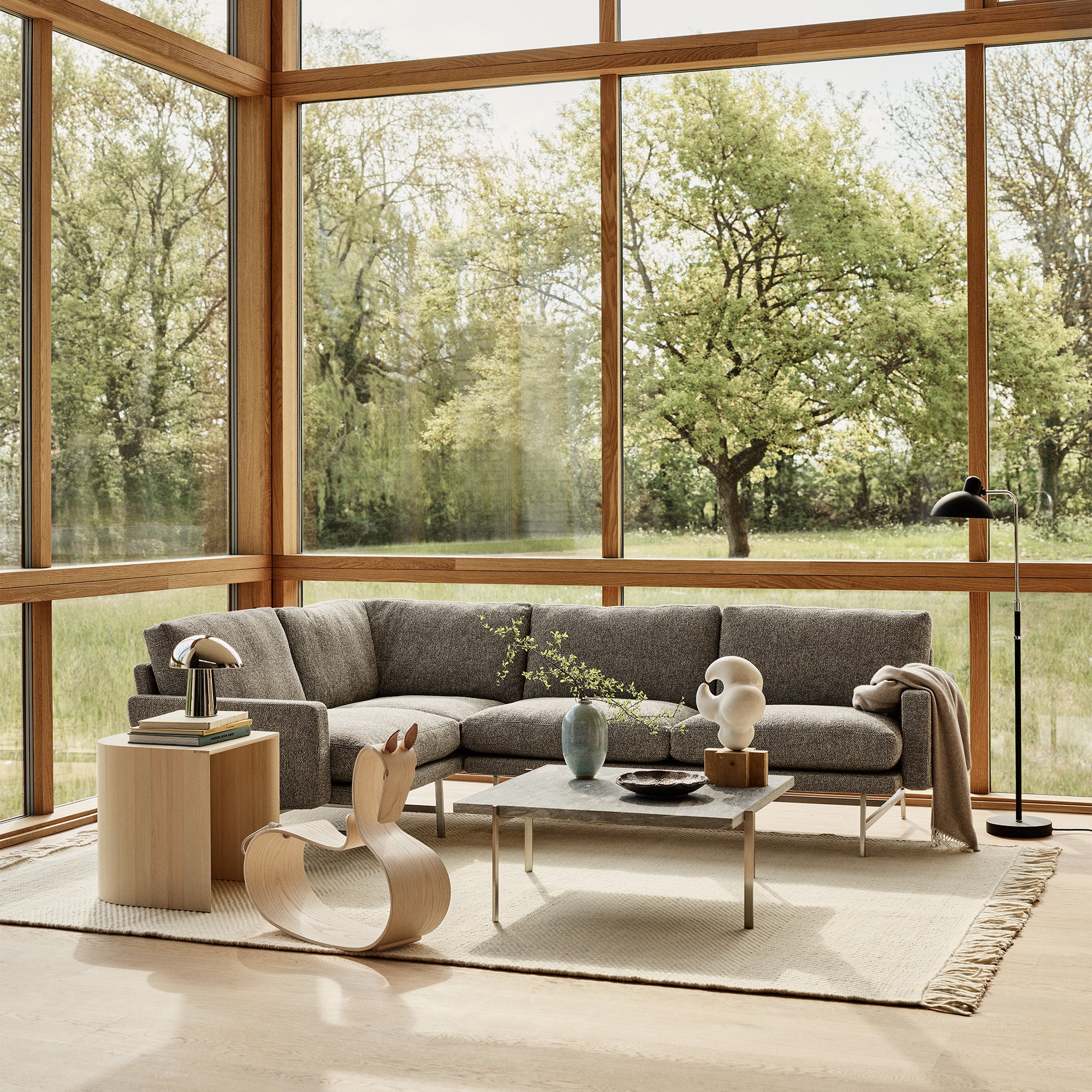 Fritz Hansen PL114 Lissoni 4 Seater Corner Sofa in Moss 015 — lifestyle, with PK61, Night Owl and Rocking Horse