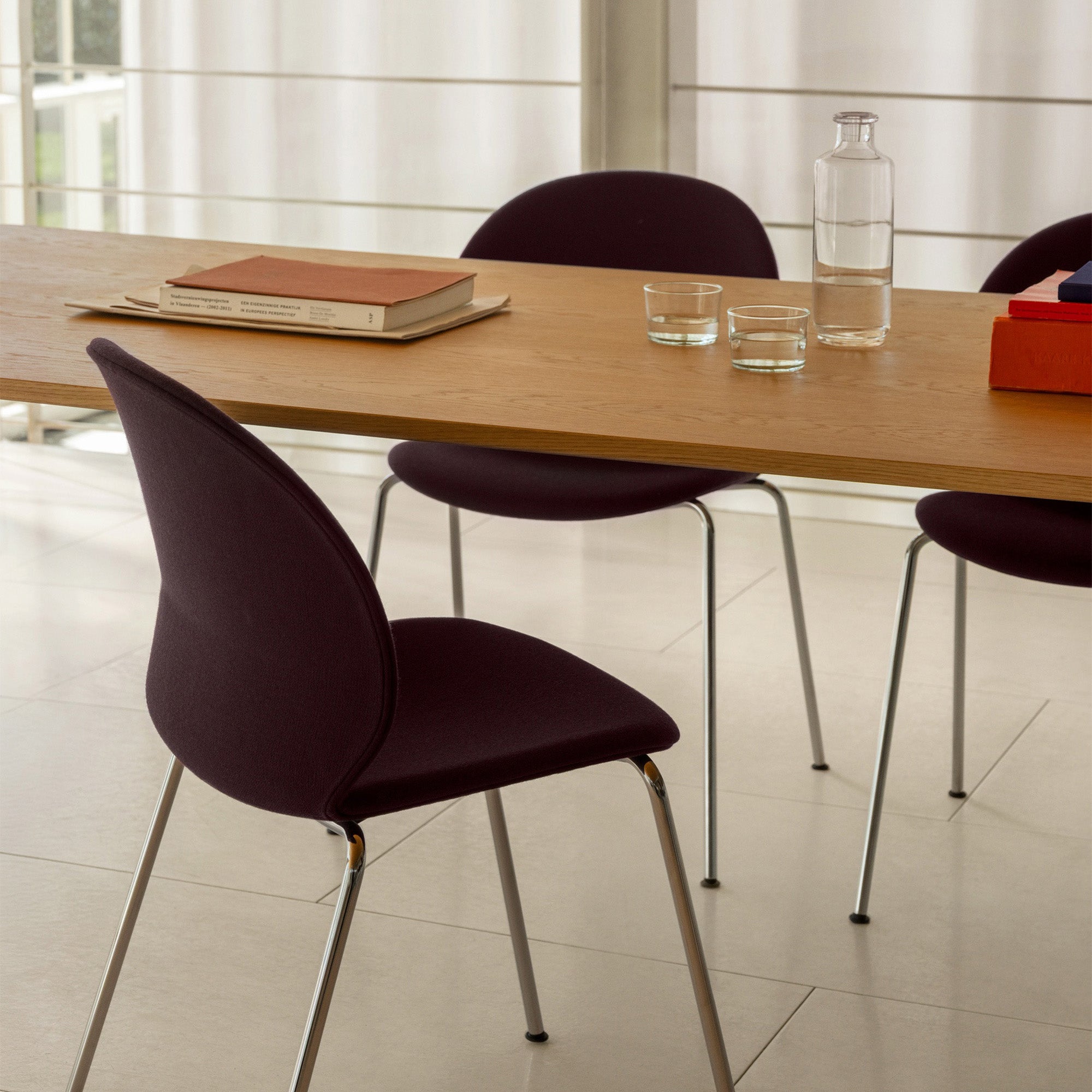 Fritz Hansen N02-10 Recycle Dining Chair Fully Upholstered in Christianshavn 1142 — lifestyle, with Pluralis KS434 table