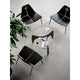 Fritz Hansen PK23 Lounge Chair Ash Black — lifestyle, with PK60 coffee table