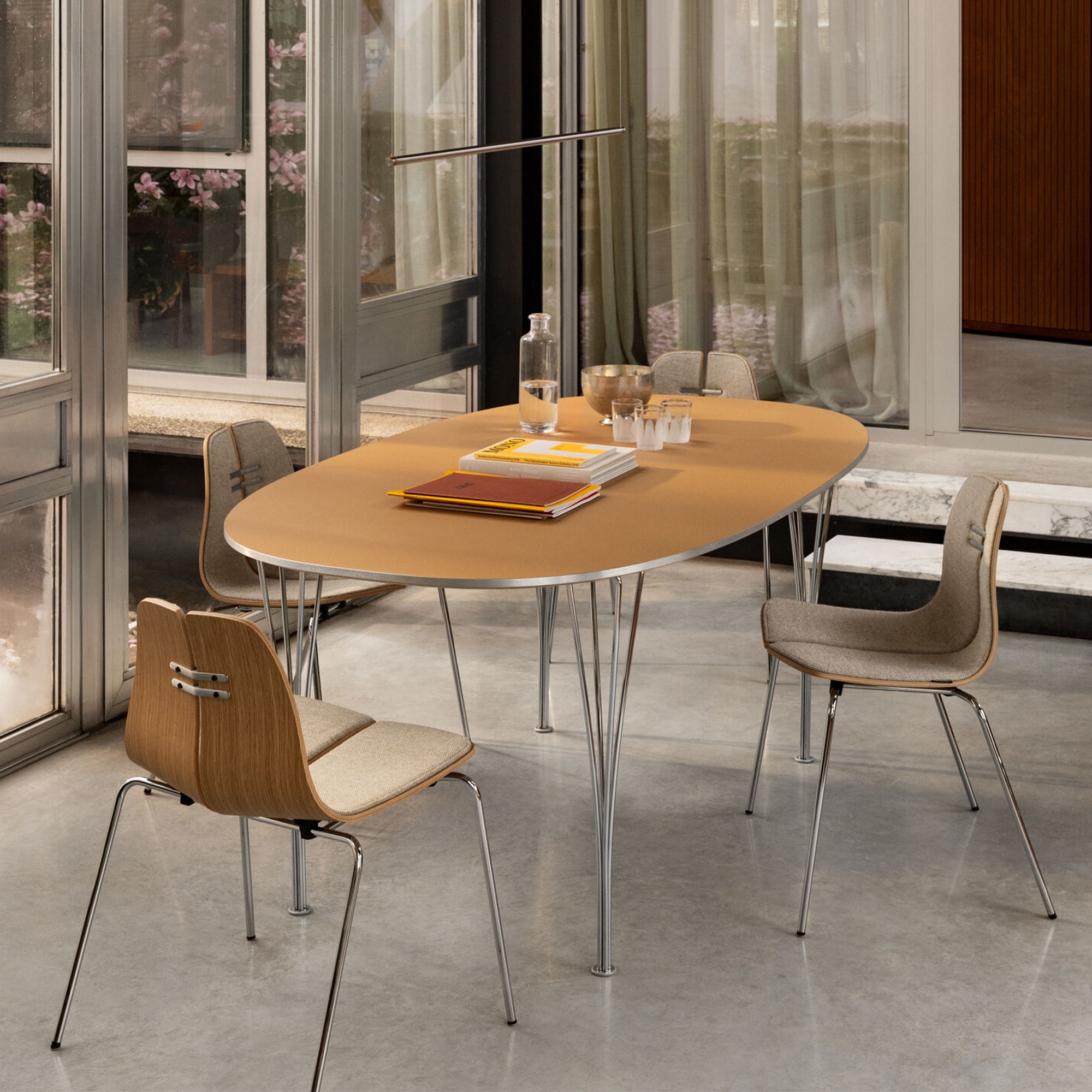 Fritz Hansen Superellipse Dining Table B616 — lifestyle, dining room with PK3 chairs and Oneline pendant