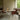 Fritz Hansen 3207 Series 7 Dining Armchair Upholstered in Chestnut leather — lifestyle, dining room with PK54 table