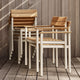 Skagerak Pelagus Outdoor Dining Chair and Dining Armchair in Light Ivory — lifestyle, stacked