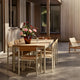 Skagerak Pelagus Outdoor Dining Armchair and Dining Chair with Extendable Dining Table and Lounge Chair in Light Ivory — lifestyle