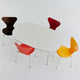Fritz Hansen 3107 Series 7 Dining Chair Verner Panton 100 around a Superellipse Dining Table white background