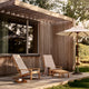 Skagerak Between Lines Deck Chair and Between Lines Deck Chair Cushion with Between Lines Deck Stool — lifestyle