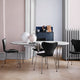 Fritz Hansen Superellipse Extendable Dining Table in Fenix Laminate White — lifestyle, with Series 7