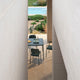 Fritz Hansen Vind Outdoor Dining Table, Armchair and Chair in Hunter Green — lifestyle view 