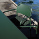 Fritz Hansen Vind Table and Armchair in Hunter Green — close-up detail