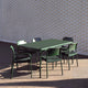 Fritz Hansen Vind Table with Chair and Armchair in Hunter Green — lifestyle view