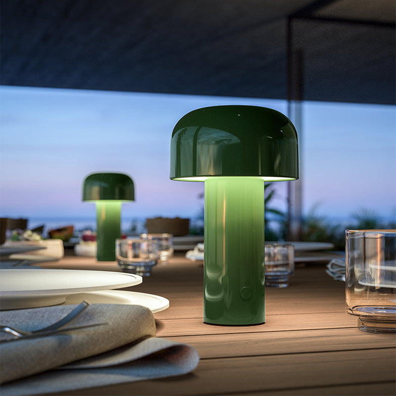 Flos Bellhop LED Table Light in Glossy Green — lifestyle, terrace