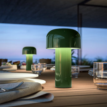 Flos Bellhop LED Table Light in Glossy Green — lifestyle, terrace