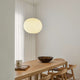 Flos Glo-Ball S2 Pendant Light in White — lifestyle, dining room