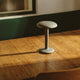 Flos Gustave Residential Table Light in Raw Aluminium — lifestyle
