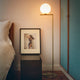 Flos IC F2 Floor Lamp in Brushed Brass — lifestyle