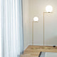 Flos IC Floor Lamp in Brushed Brass — lifestyle