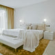 Flos KTribe W Wall Light — lifestyle, bedroom