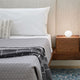 Flos Glo-Ball Mini Table Light — lifestyle, bedside table