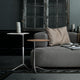 Fritz Hansen Little Friend Side Table — lifestyle, white and wood tops beside Alphabet Sofa