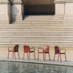 HAY Deville Outdoor Dining Armchair in Iron Red — lifestyle
