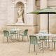 HAY Deville Outdoor Dining Armchair in Thyme Green — lifestyle