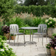 HAY Deville Patio Dining Bundle 80cm in Silver Grey Aluminium — two armchairs and round table, garden setting