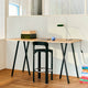 HAY Apex Desk Lamp in Emerald Green — studio, with Loop Stand High Table and Rey Bar Stool