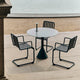HAY Palissade Cantilever Armchair in Anthracite — lifestyle, with Palissade Cone Table and HAY Host Portable Lamp