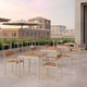 Skagerak Pelagus Outdoor Dining Armchair and Sqaure Table in Light Ivory — lifestyle, hospitality setting