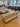 Hay Amanta Sofa by mario bellini launch 3dd 2025. Modern living room with beige sofas, wooden coffee tables, and large windows.