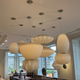 collection of Hay George Nelson Bubble pendants in their store in Copenhagen